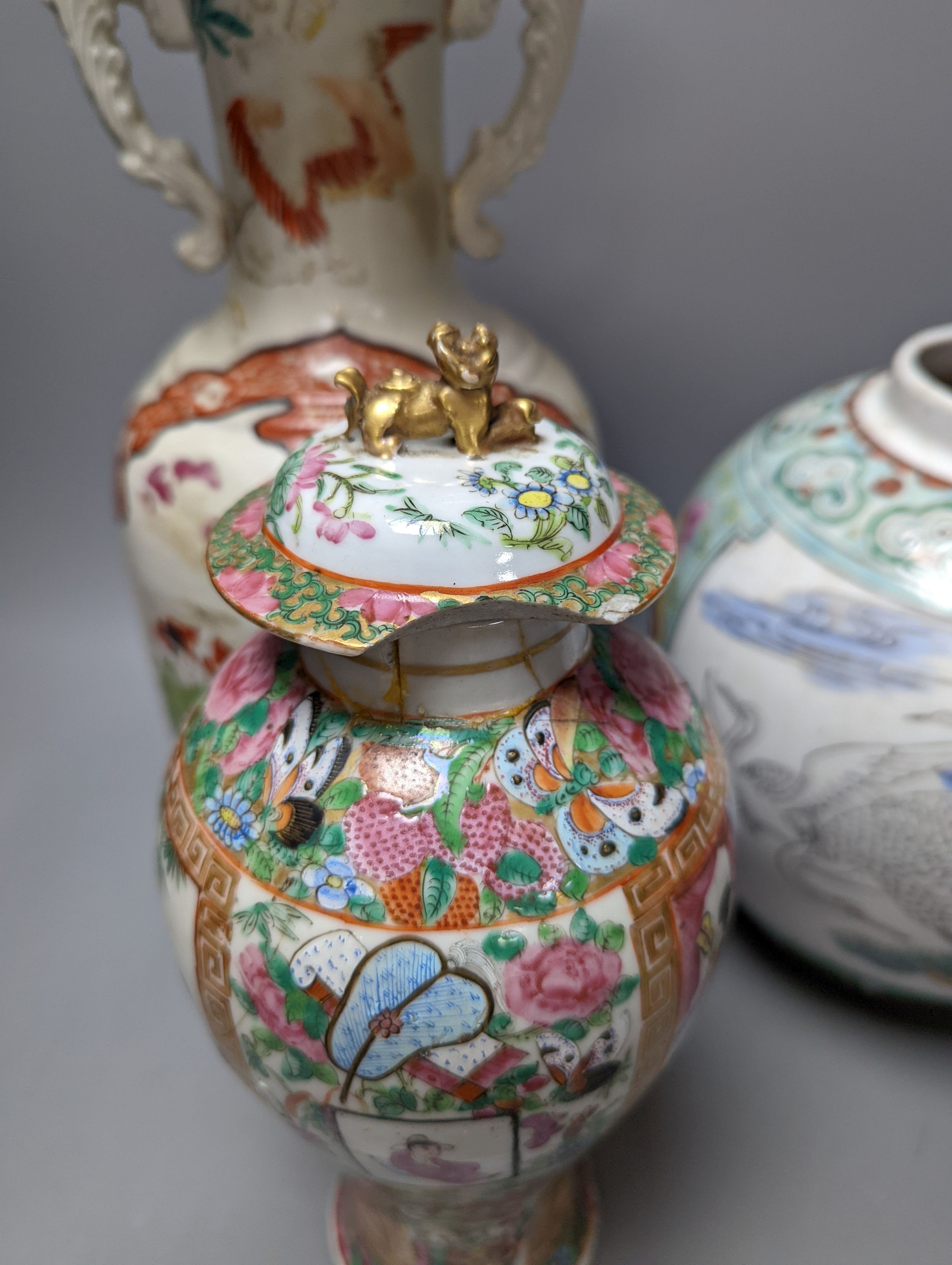 A Chinese famille rose vase and two ginger jars, together with a Japanese vase, 38cm